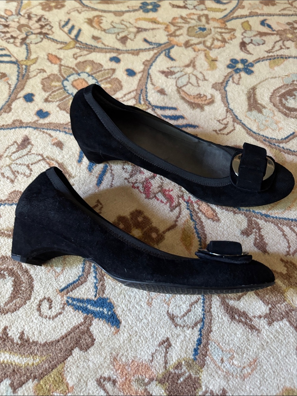Stuart Weitzman black suede pumps with decorative bows. Size 8.5. Made in Spain.